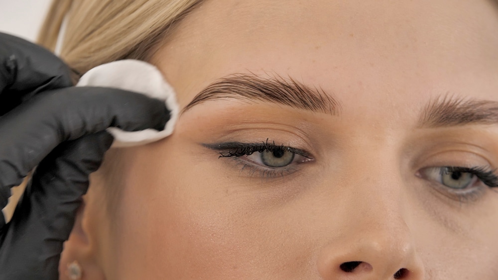 Stylist's,Hands,In,Black,Gloves,Wipe,The,Model,Face,With